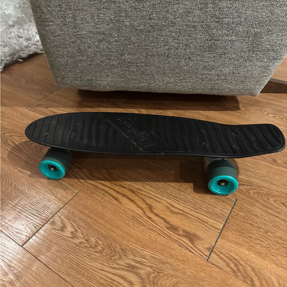 Black Penny Board with Teal Wheels